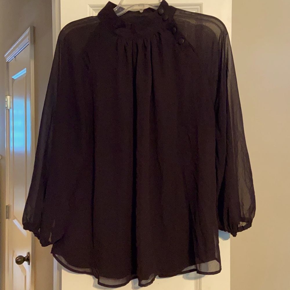 Sheer sleeve top